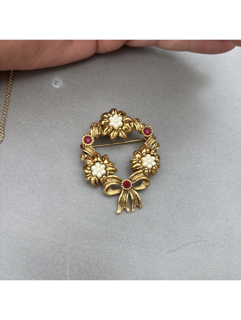 Avon  gold-tone Faux Pearl & Red Rhinestone Floral Wreath Ribbon Brooch